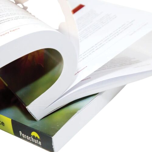 Close-up of BC Adhesives’ perfect binding adhesive securing a book’s spine for a durable, professional finish.